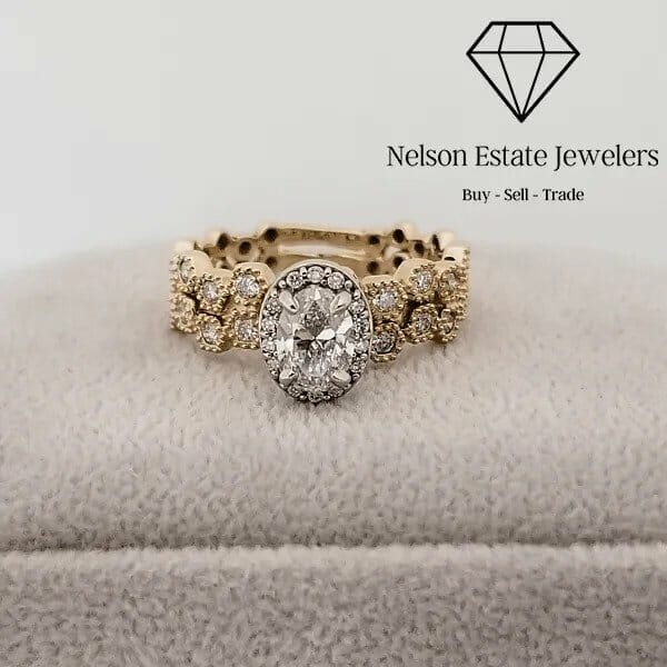 A gold ring with a diamond on it.