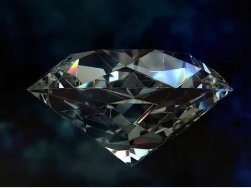 A diamond is shown on a dark background.