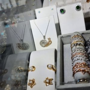 A display of jewelry in a display case.