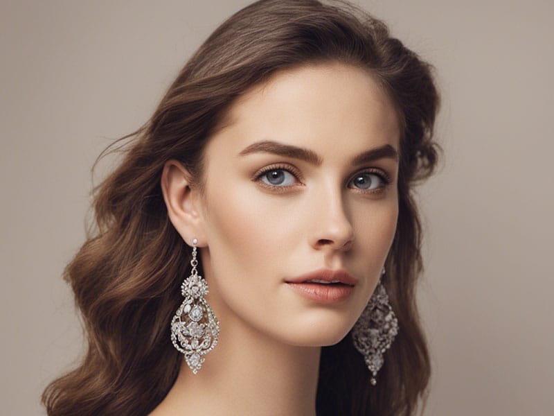 A beautiful woman wearing a pair of Chandelier Earrings.