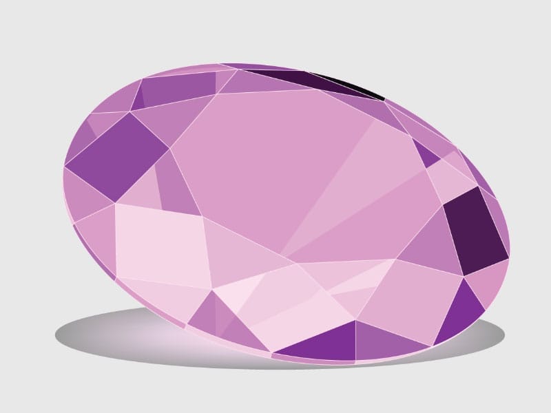 A February Amethyst gemstone on a white background.