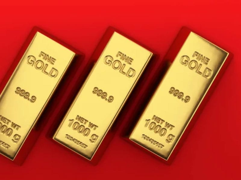 Three gold bars on a red background.