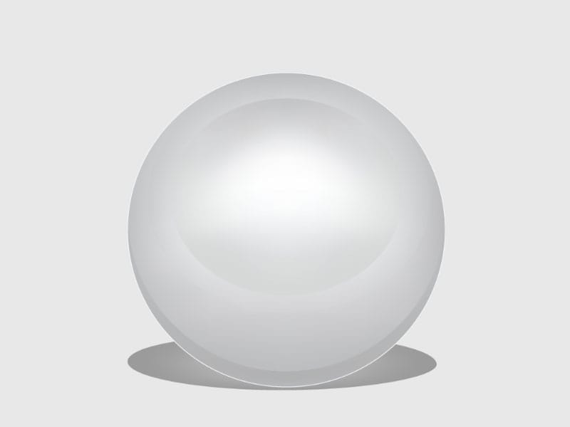A white egg on a gray background.