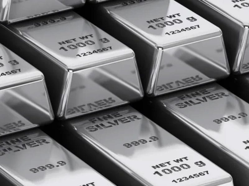 Silver bars stacked on top of each other.
